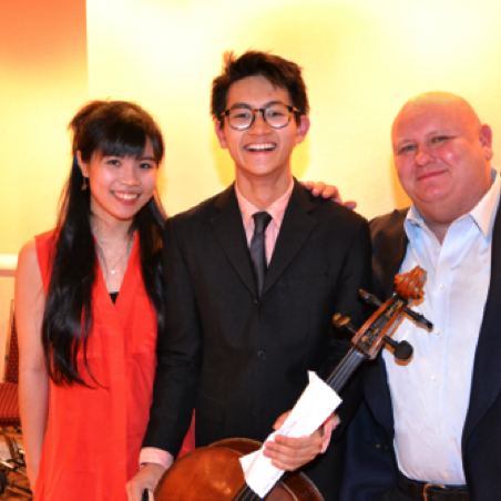 Cellist Nathan Chan, center, received the Helen Roosevelt $5000 career grant. On right, pianist Mika Emily Sasaki and Salon board member Jay Fallon of Armonk, NY.